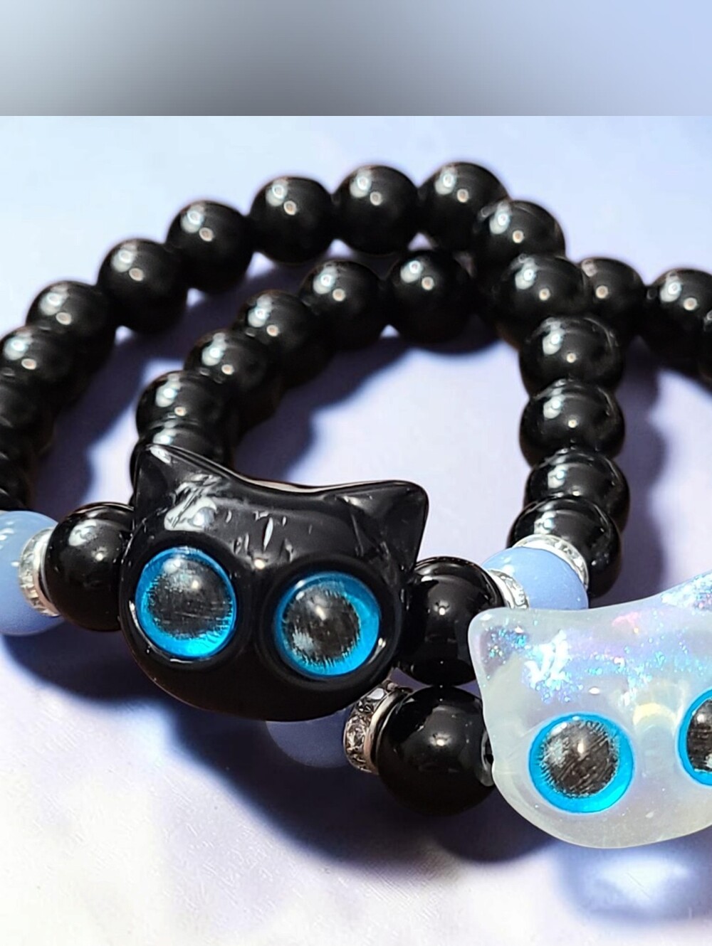 Black Beaded Cat Bracelet with Light Blue Accents